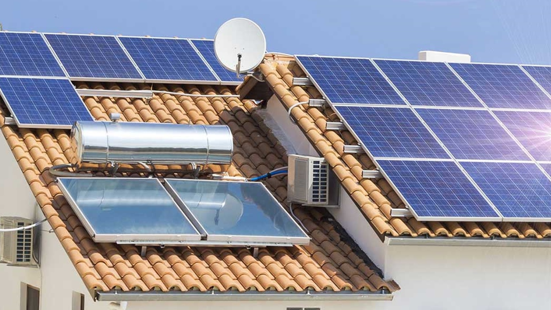 Rash Power Solutions installation team working on solar panels in Malawi